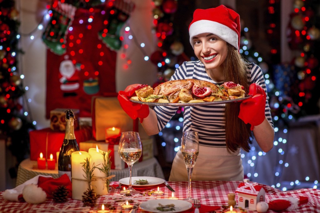 Woman preparing for Christmas dinner